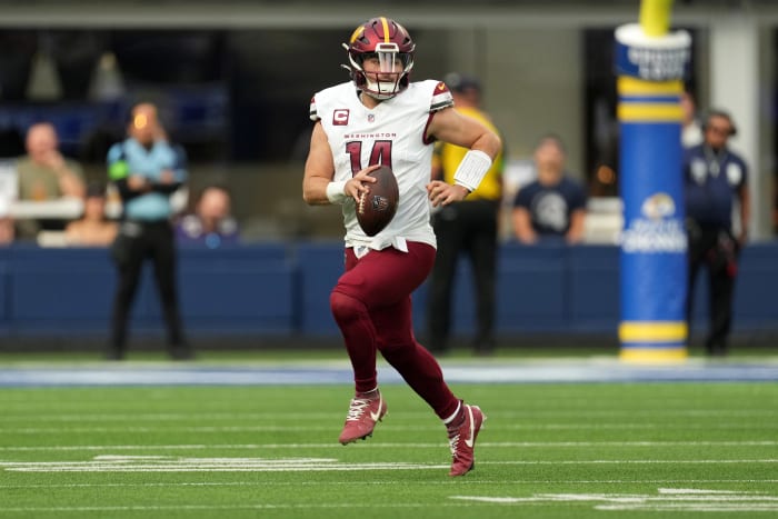 Dec 17, 2023; Inglewood, California, USA; Washington Commanders quarterback Sam Howell (14) throws the ball against the Los Angeles Rams in the first half at SoFi Stadium.